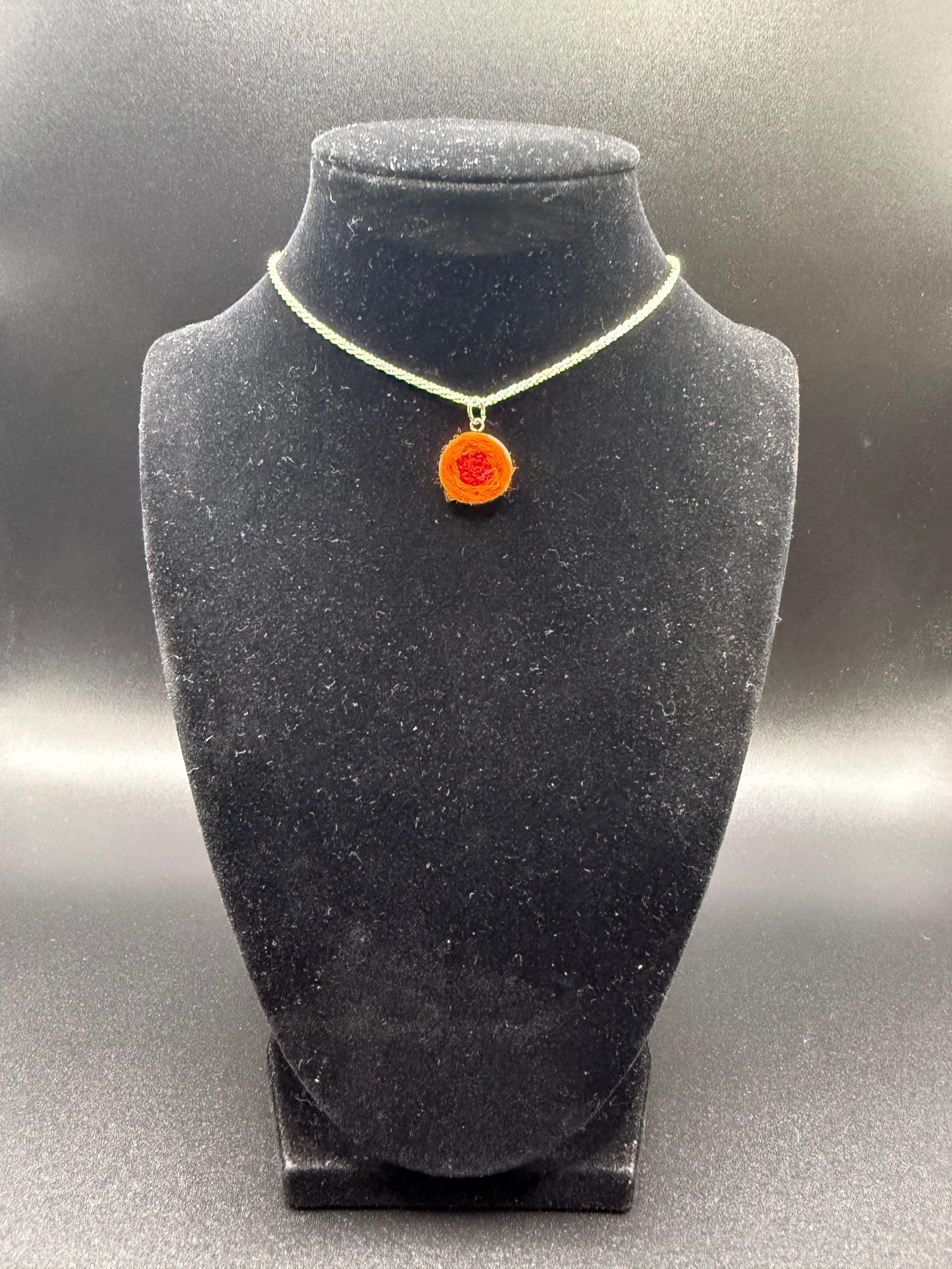Embroidered Orange and Red Flower Pendant